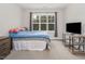 Well-lit bedroom with large window, offering ample space at 370 Chapel Ridge Dr, Pittsboro, NC 27312