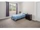Cozy bedroom features carpet, large window, and ample space at 370 Chapel Ridge Dr, Pittsboro, NC 27312