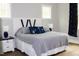 Comfortable bedroom with hardwood floors, stylish headboard, and matching nightstands at 370 Chapel Ridge Dr, Pittsboro, NC 27312