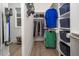 Walk-in closet with custom shelving, wooden floors, and window offering natural light at 370 Chapel Ridge Dr, Pittsboro, NC 27312