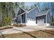 Stunning home with a three-car garage and beautifully landscaped yard at 370 Chapel Ridge Dr, Pittsboro, NC 27312