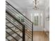 Bright foyer features hardwood floors, modern staircase, and an inviting entrance at 370 Chapel Ridge Dr, Pittsboro, NC 27312