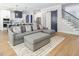 Open floor plan with a modern living room and a view to the kitchen at 370 Chapel Ridge Dr, Pittsboro, NC 27312