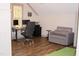 Home office with modern desk, chair, comfortable seating, and hardwood flooring at 370 Chapel Ridge Dr, Pittsboro, NC 27312