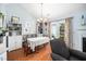 Cozy dining area featuring elegant décor, hardwood floors, and natural light, creating a perfect ambiance for intimate meals at 3708 Turnbull Ct, Raleigh, NC 27616