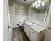 Bathroom featuring a granite countertop and new flooring at 3711 Halford Dr, Raleigh, NC 27604