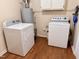 Well-equipped laundry area with modern appliances and water heater at 3711 Halford Dr, Raleigh, NC 27604