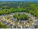 Stunning aerial view of a well-planned community with lush greenery and beautifully landscaped residential areas at 374 Ashley Woods Ct, Clayton, NC 27527