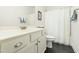 Bathroom featuring a vanity, and a tub shower with a white shower curtain at 374 Ashley Woods Ct, Clayton, NC 27527
