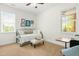 Comfortable bedroom featuring a daybed, large windows and a light-filled interior at 374 Ashley Woods Ct, Clayton, NC 27527