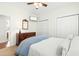 Comfortable bedroom featuring a ceiling fan, TV, dresser with a mirror, and a comfortable bed at 374 Ashley Woods Ct, Clayton, NC 27527