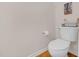 Powder room featuring a toilet, fresh linens, and a cute wall hanging at 4 Scottish Ln, Durham, NC 27707
