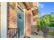 Charming front door with decorative wreath, enhancing the brick facade and cozy entryway at 4 Scottish Ln, Durham, NC 27707