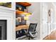 Built-in desk area with shelving provides an ideal space for a home office in this residence at 4 Scottish Ln, Durham, NC 27707