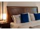 Close up on a main bedroom's bed and pillows, showcasing its comfort and style at 4 Scottish Ln, Durham, NC 27707