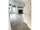 Bright living room with hardwood floors, fireplace, and a door leading to the outside at 411 Gooseneck Drive # B6, Cary, NC 27513