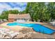 Community pool features a spacious deck with ample lounge chairs and a well-maintained pool at 411 Gooseneck Drive # B6, Cary, NC 27513