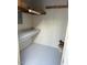 Unfinished storage room with concrete floors and exposed beams at 411 Gooseneck Drive # B6, Cary, NC 27513