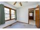 Bright bedroom with natural light, neutral carpet, and traditional wood trim at 4308 James Rd, Raleigh, NC 27616