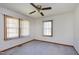 A carpeted bedroom featuring bright natural light with white walls at 4308 James Rd, Raleigh, NC 27616
