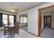Cozy dining area with classic wood furniture and a ceiling fan at 4308 James Rd, Raleigh, NC 27616