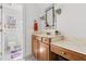 Stylish bathroom vanity with a decorative mirror and modern fixtures at 500 Walnut Hill Dr, Hillsborough, NC 27278