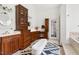 Spacious bathroom featuring custom cabinets, dual sinks, and natural light at 500 Walnut Hill Dr, Hillsborough, NC 27278
