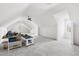 Spacious bonus room with vaulted ceilings, a ceiling fan and bright windows at 500 Walnut Hill Dr, Hillsborough, NC 27278