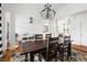 Open-concept dining room with hardwood floors at 500 Walnut Hill Dr, Hillsborough, NC 27278