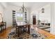 Dining room with elegant lighting, area rug and stylish decor at 500 Walnut Hill Dr, Hillsborough, NC 27278