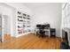 Bright office space featuring hardwood floors, built in bookcase and ample natural light at 500 Walnut Hill Dr, Hillsborough, NC 27278