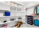 Walk-in closet featuring built in shelving and rods for optimal organization and storage at 500 Walnut Hill Dr, Hillsborough, NC 27278