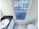 Bathroom includes a sink, toilet, and window letting in lots of natural light at 5005 Baywood Forest Dr, Knightdale, NC 27545