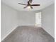 Bedroom features neutral walls, carpet, ceiling fan and light, and plenty of space at 5005 Baywood Forest Dr, Knightdale, NC 27545
