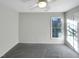 Bedroom features neutral walls, carpet, ceiling fan and light, and natural light at 5005 Baywood Forest Dr, Knightdale, NC 27545