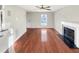 Bright living room with hardwood floors and a fireplace at 5005 Baywood Forest Dr, Knightdale, NC 27545
