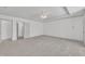 Expansive bedroom includes neutral carpet and recessed ceiling lights at 5033 Homeplace Dr, Apex, NC 27539