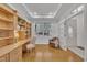 Charming office with built-in shelving, hardwood floors, and a window, perfect for work or study at 5033 Homeplace Dr, Apex, NC 27539