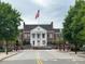 Exterior view of Cary Arts Center with American flag at 506 N Harrison Ave, Cary, NC 27513