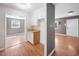 Functional kitchen showcases the connection to the living room and dining areas at 506 N Harrison Ave, Cary, NC 27513