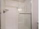 Modern bathroom shower features sleek glass door and crisp, neutral decor at 5209 Rivington Rd, Fuquay Varina, NC 27526