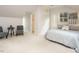 Bedroom with vaulted ceilings, 2 chairs, art prints, closet and nice grey bedspread at 5209 Rivington Rd, Fuquay Varina, NC 27526
