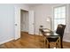 Functional office space featuring a desk, chair, and window, ideal for working from home in comfort at 5209 Rivington Rd, Fuquay Varina, NC 27526