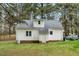 View of the house from the backyard, showcasing the outdoor spaces at 5578 Tabbs Creek Church Rd, Oxford, NC 27565