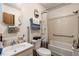 Functional bathroom featuring a shower-tub combination, grab bars, and a single vanity at 5578 Tabbs Creek Church Rd, Oxford, NC 27565