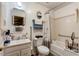 Functional bathroom featuring a shower-tub combination with grab bars, and a single vanity at 5578 Tabbs Creek Church Rd, Oxford, NC 27565