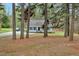 View of the house through the trees at 5578 Tabbs Creek Church Rd, Oxford, NC 27565