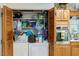 Kitchen with laundry, oven, stainless steel appliances and spacious storage at 5578 Tabbs Creek Church Rd, Oxford, NC 27565