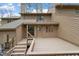 Backyard view with a large wooden deck that adds a cozy outdoor living space at 58 Stoneridge Rd, Durham, NC 27705