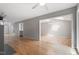 Open living room layout showcasing hardwood flooring, recessed lights and neutral wall paint at 58 Stoneridge Rd, Durham, NC 27705